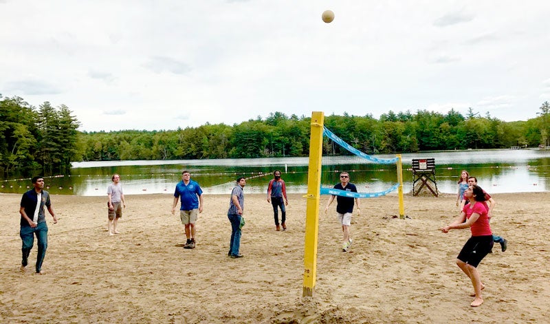 MSE students and faculty playing volleyball 